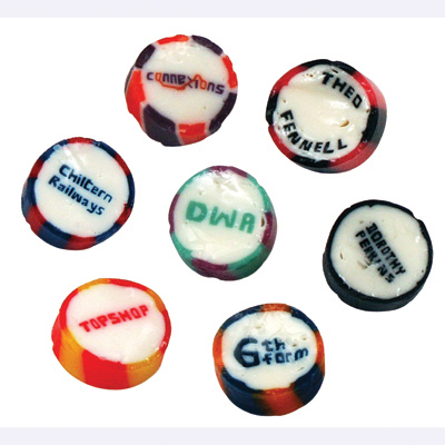Rock sweets with name or logo going through the mint or fruit flavoured rock sweet